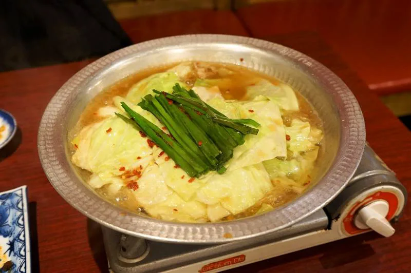 福岡県 北九州市の 小倉鉄なべ総本店 で八幡鉄なべ餃子 じんだ煮 ごま鯖を堪能